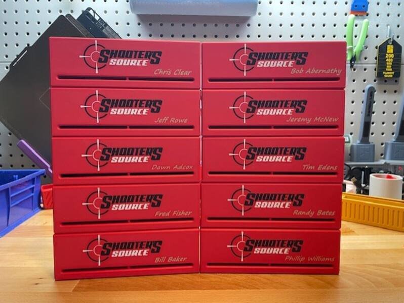 Shooter's Source bulk order — 10 personalized caddies stacked